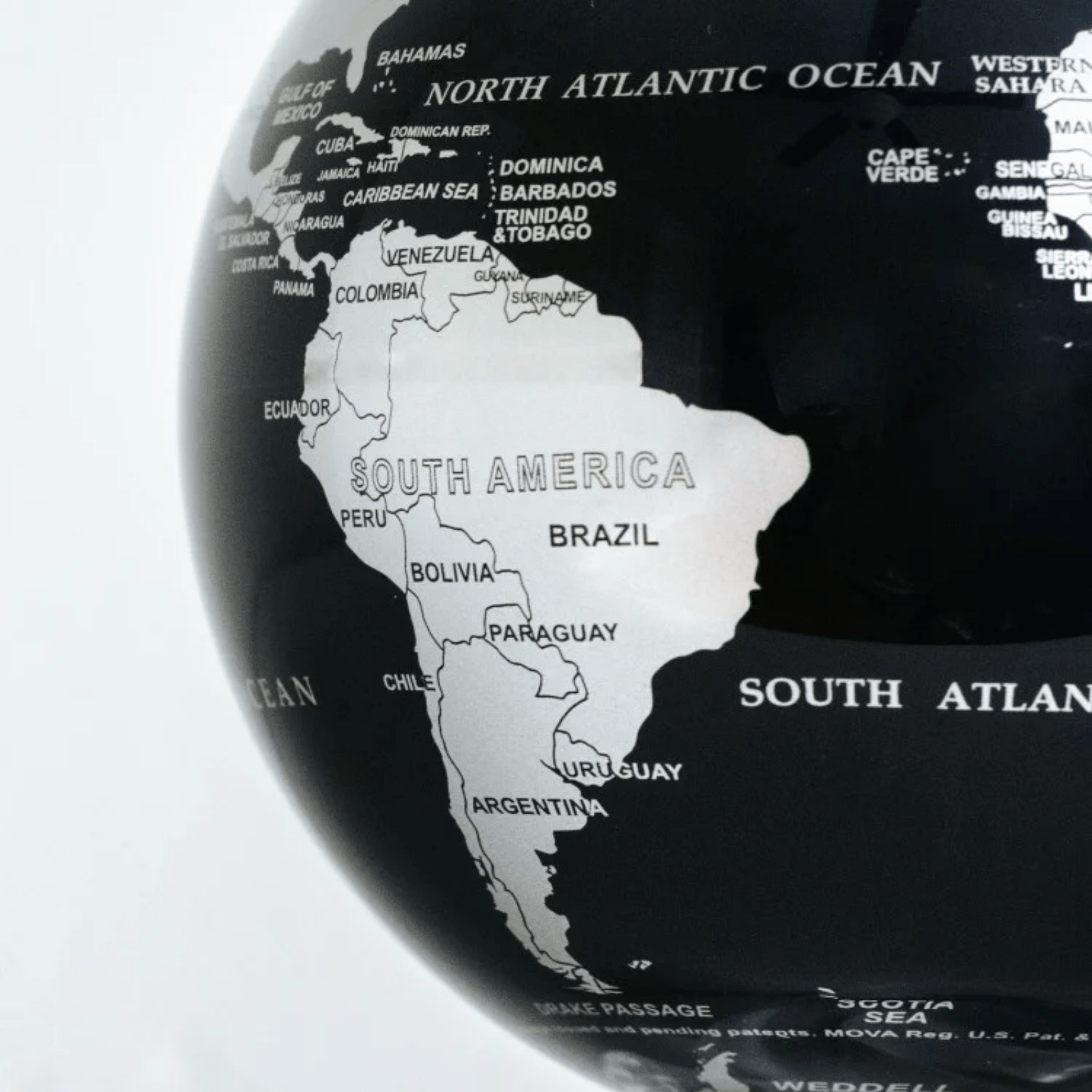 Black & Silver Solar Powered Spinning Globe - Lizzy G's Fine Gifts